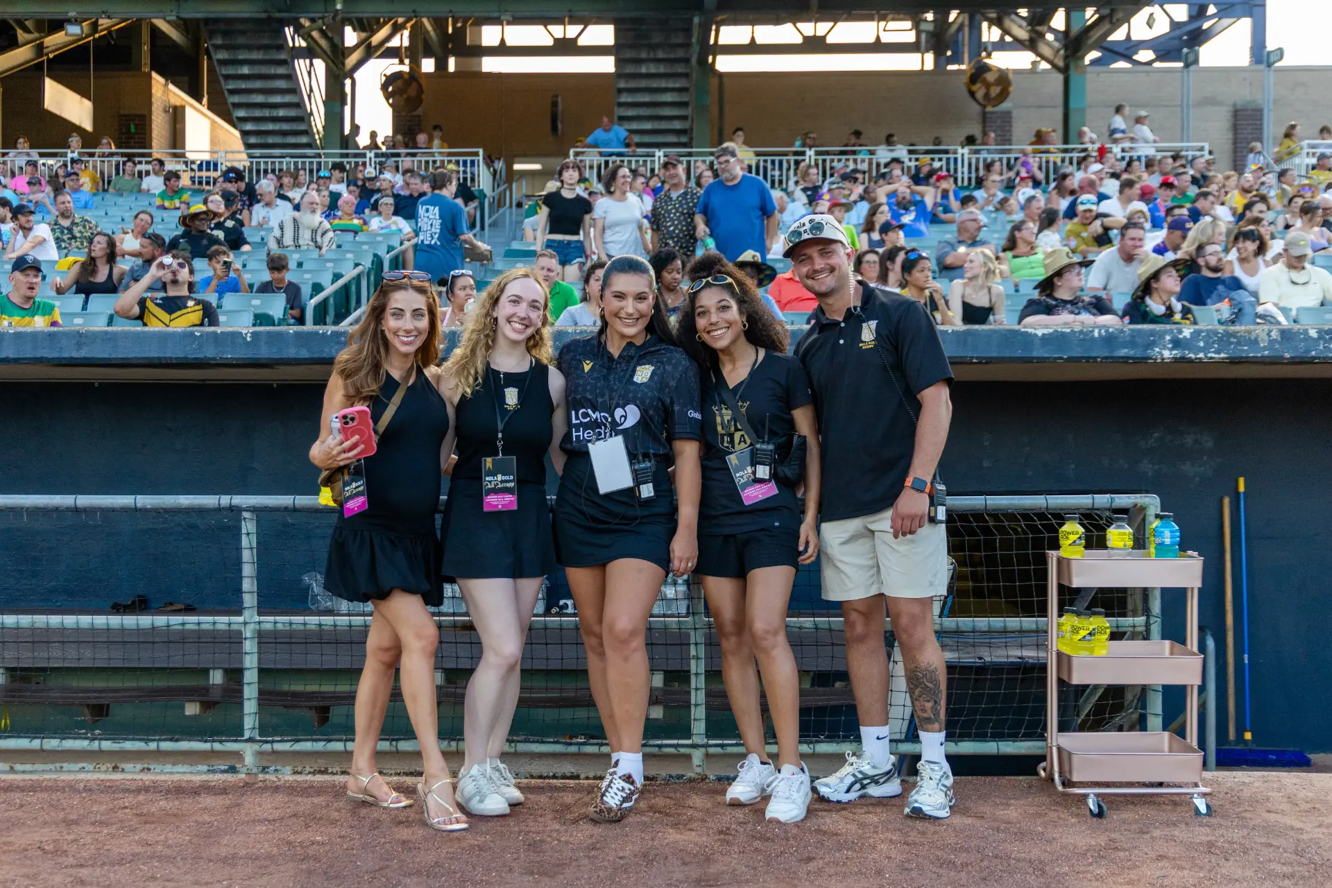 NOLA Gold Rugby event staff posing together at the venue